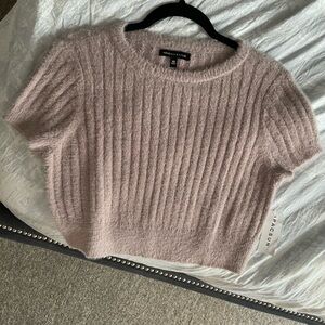 Nice fall top mauve in color brand new I got it from Pacsun.